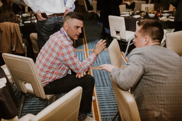 Two members sharing perspective one-on-one